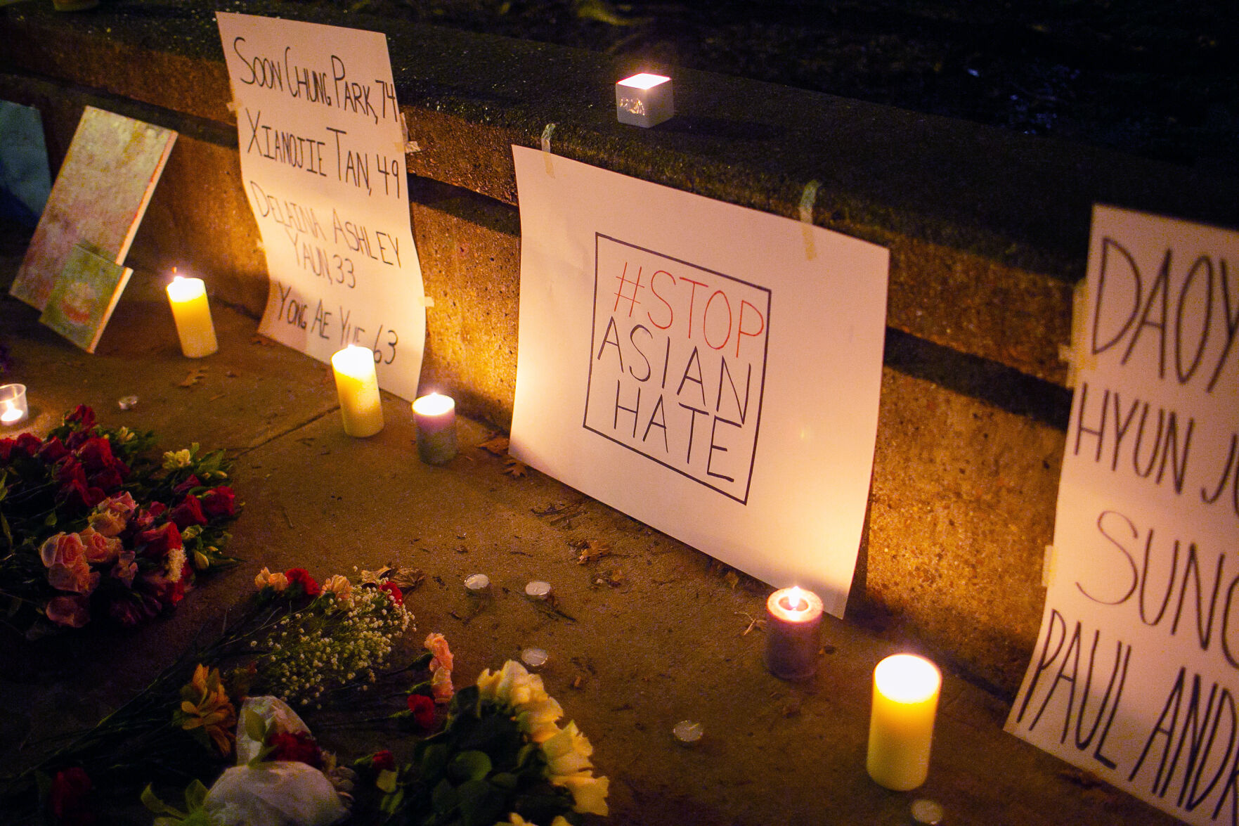 Signs with the names of the eight victims of the March 16 shootings in Atlanta